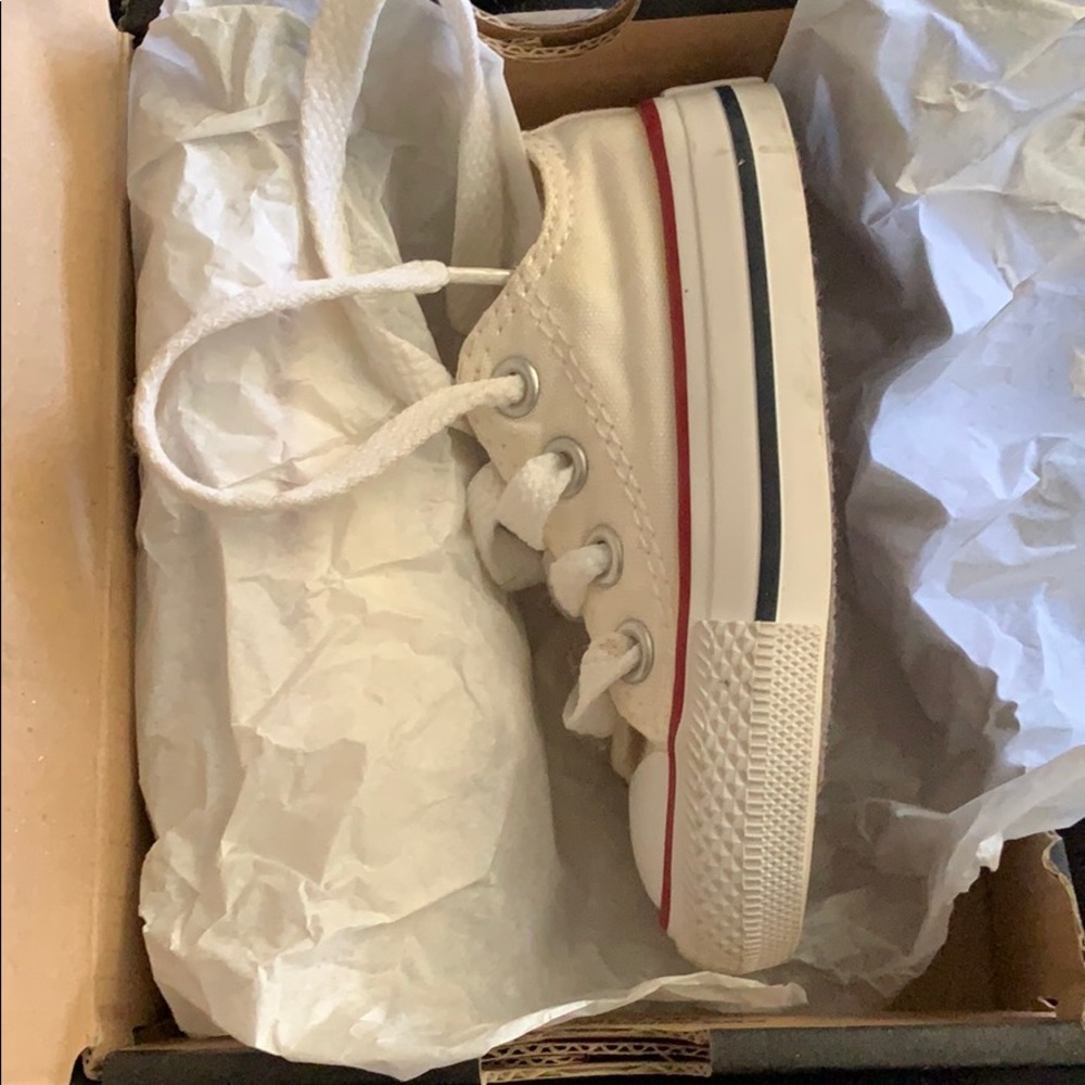 White with blue/red trimming converse size 3